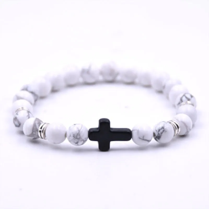 1758778608056 Pulsera blanca con cruz