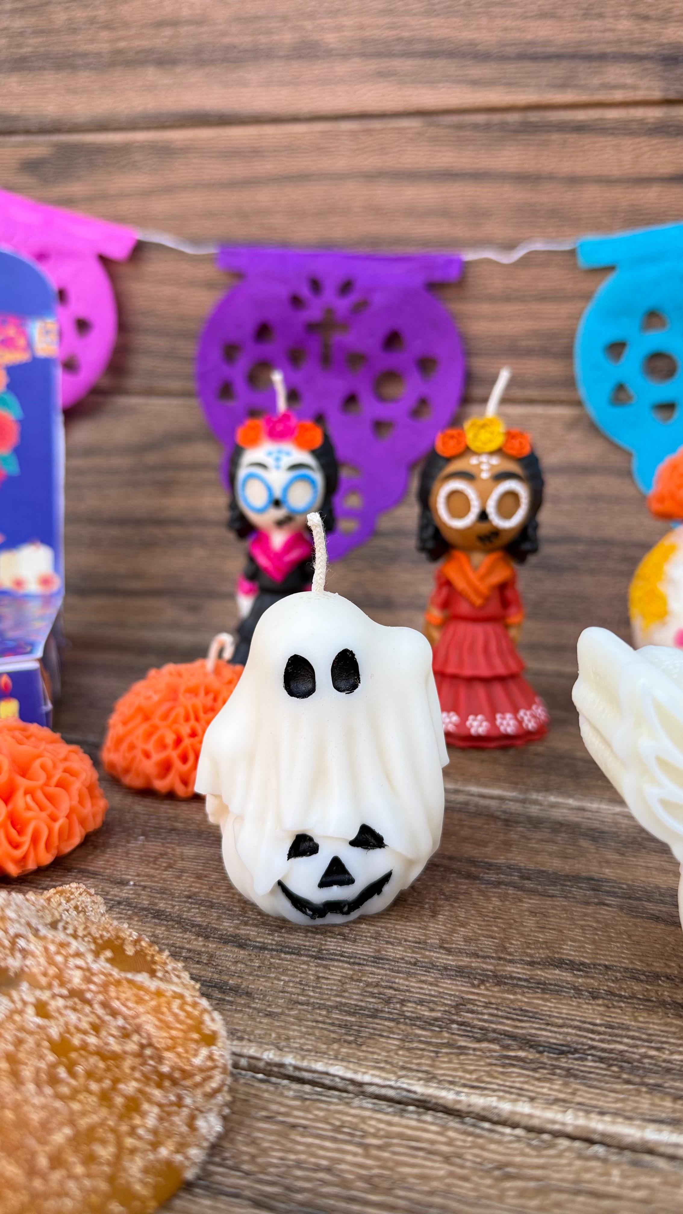 76c3a6d4-c9c7-4fd1-9018-d537a5a1028b Vela decorativa fantasma