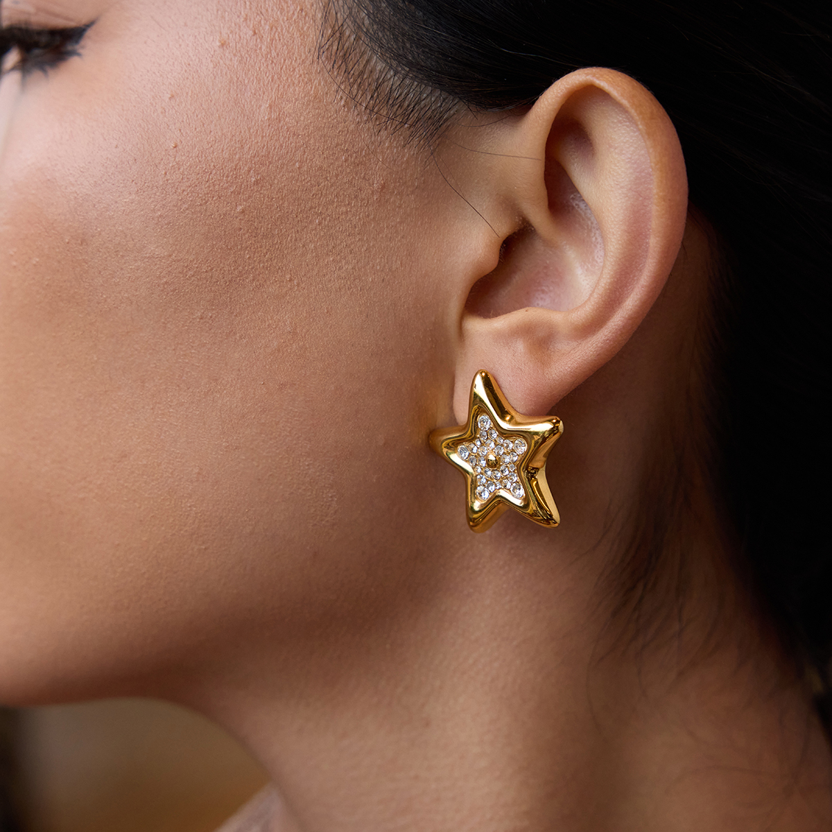 Aretes estrella dorado