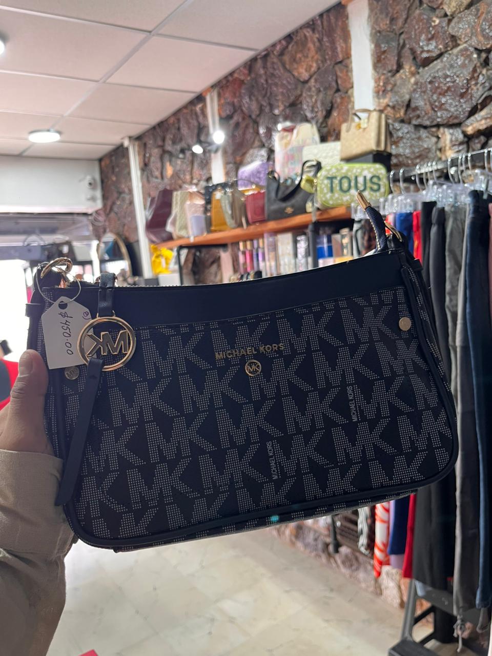 WhatsApp Image 2025-11-10 at 1.29.23 PM Bolsa Mk monogramas en color azul