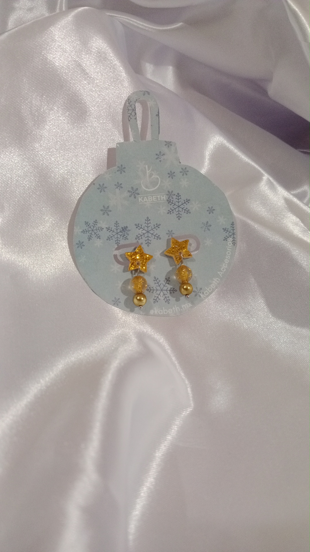 IMG_20251223_172912_1 Aretes estrella navideña