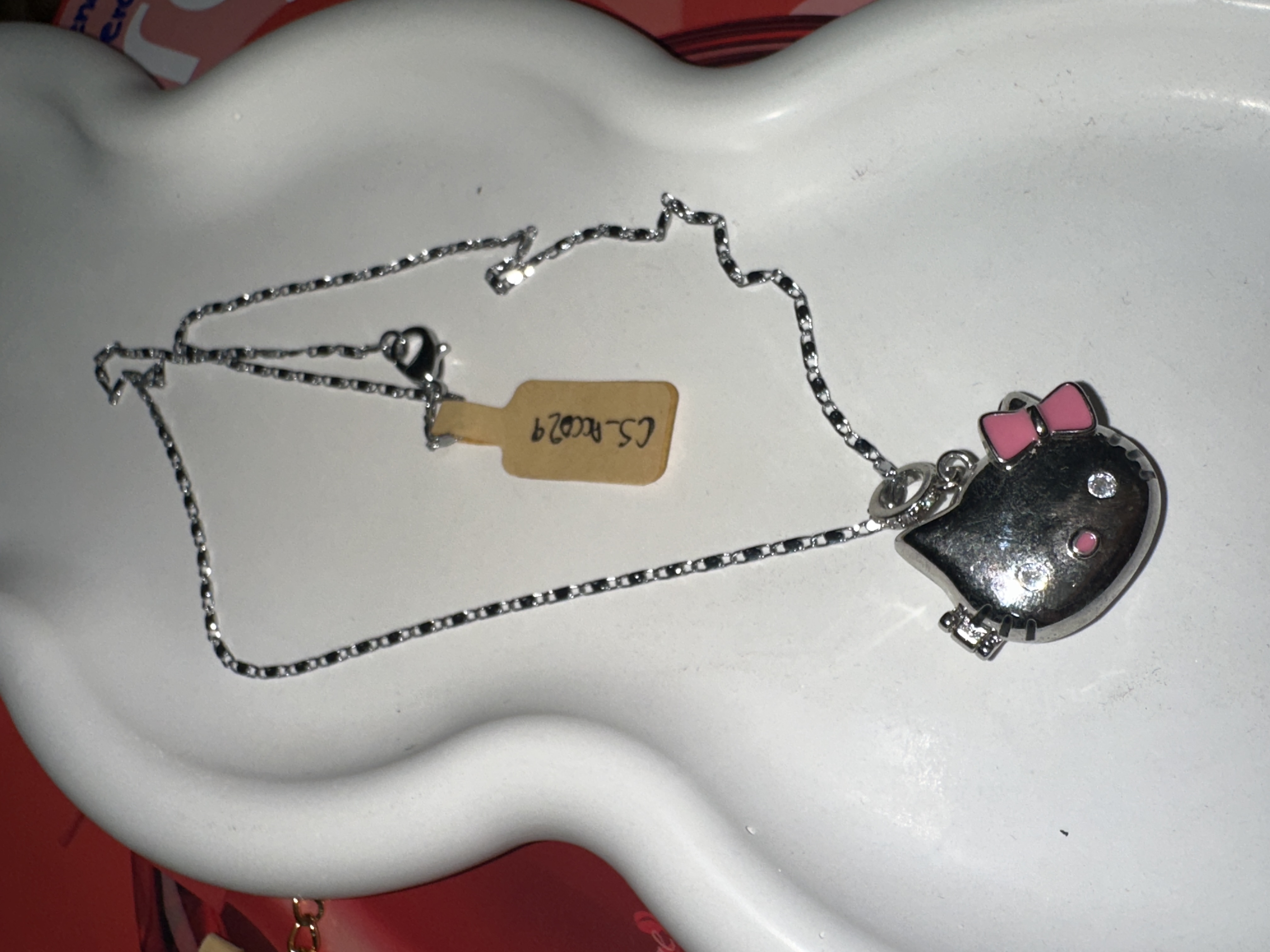 Relicario de hello kitty en color plata