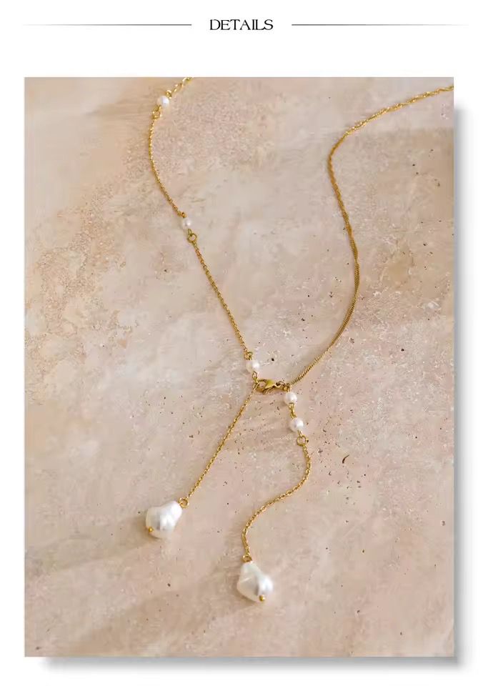 Collar corbatero perla barroca dorado