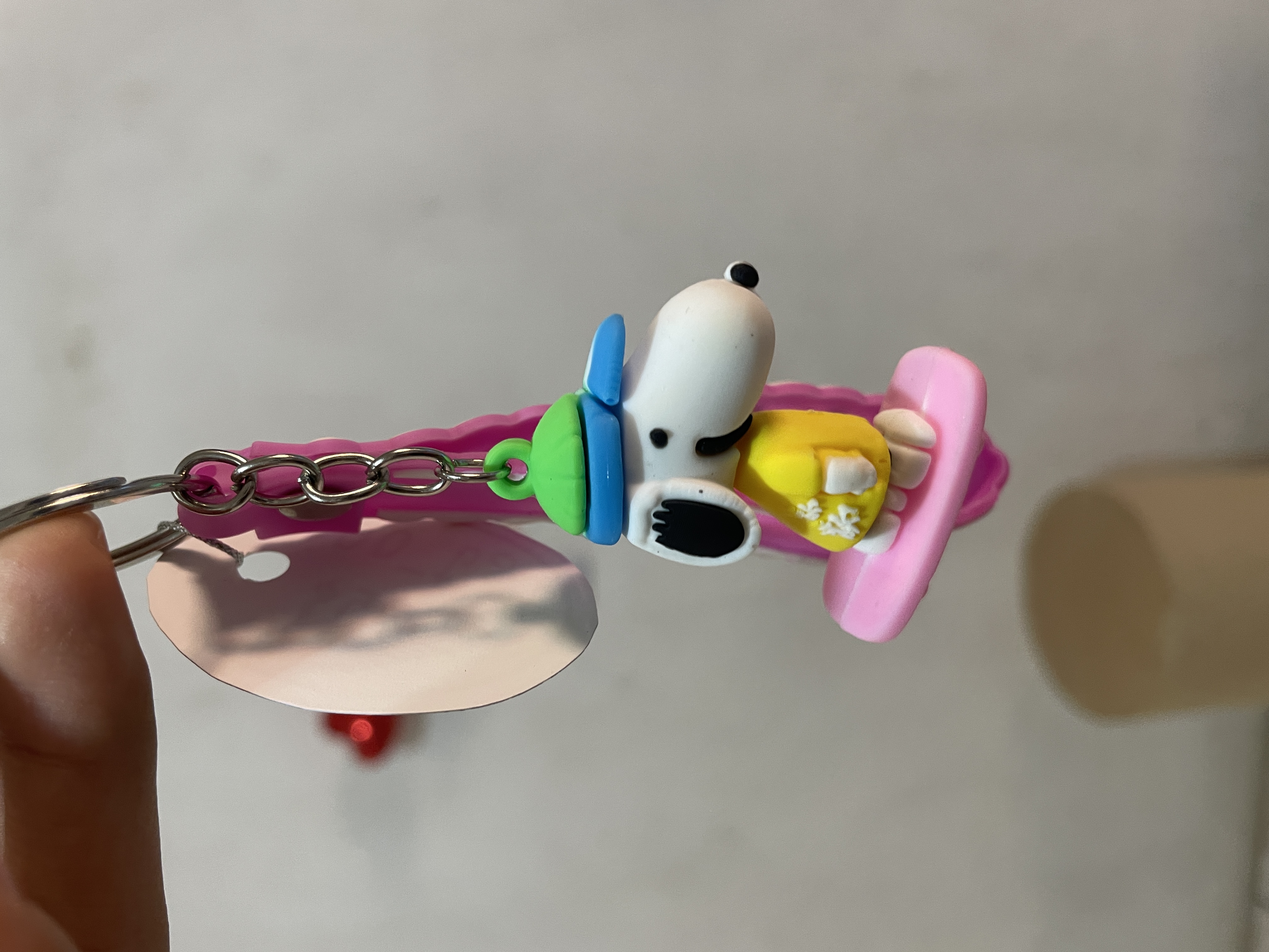Llavero snoopy patineta