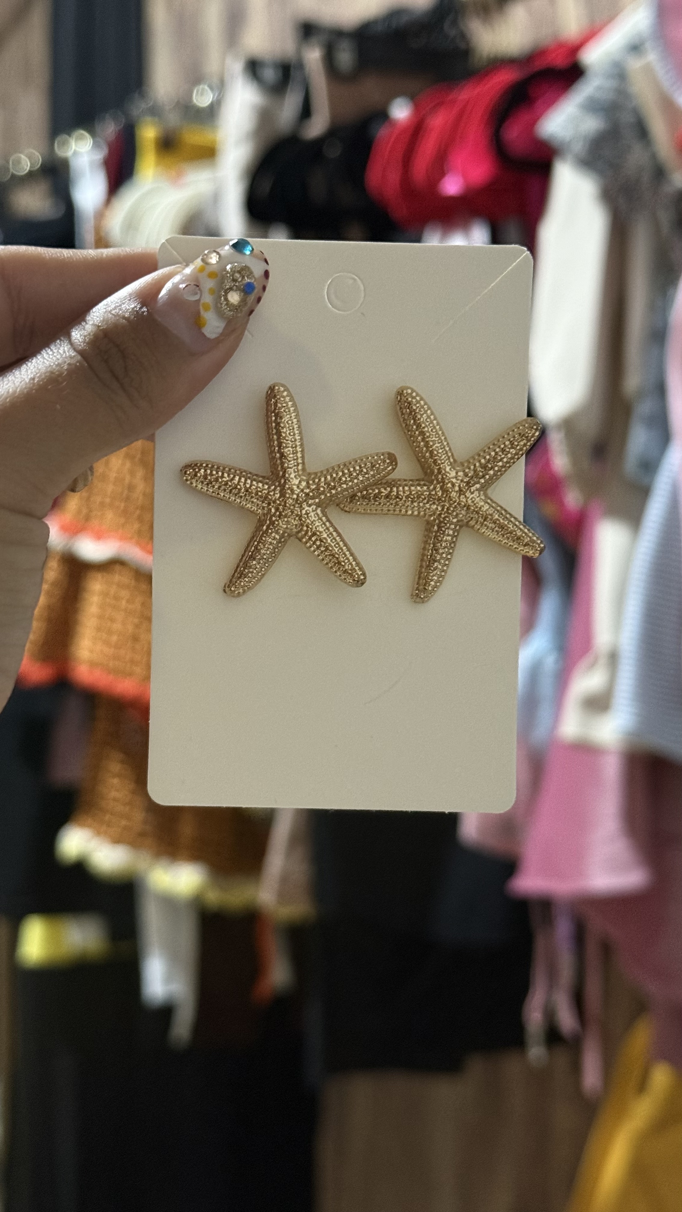 Aretes estrella dorada