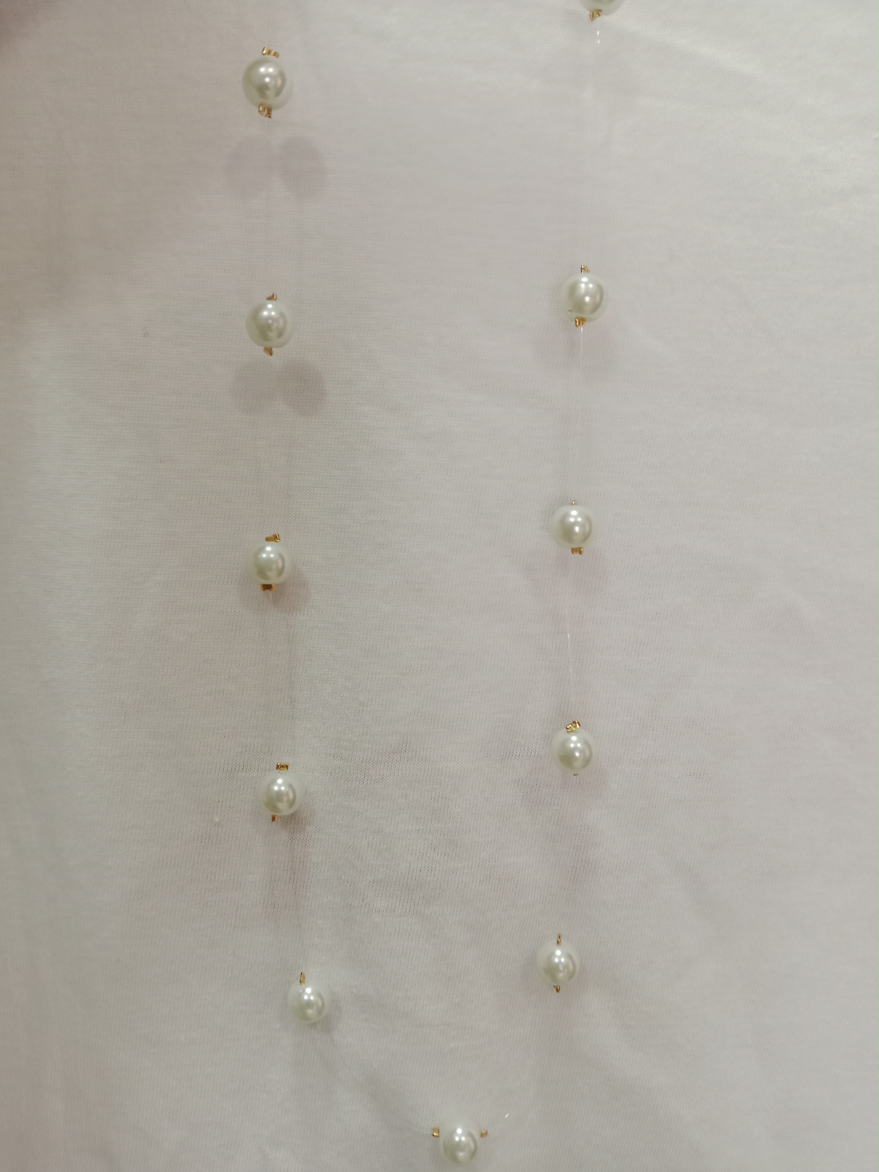 IMG_20260417_133229 Collar flotante Perlas