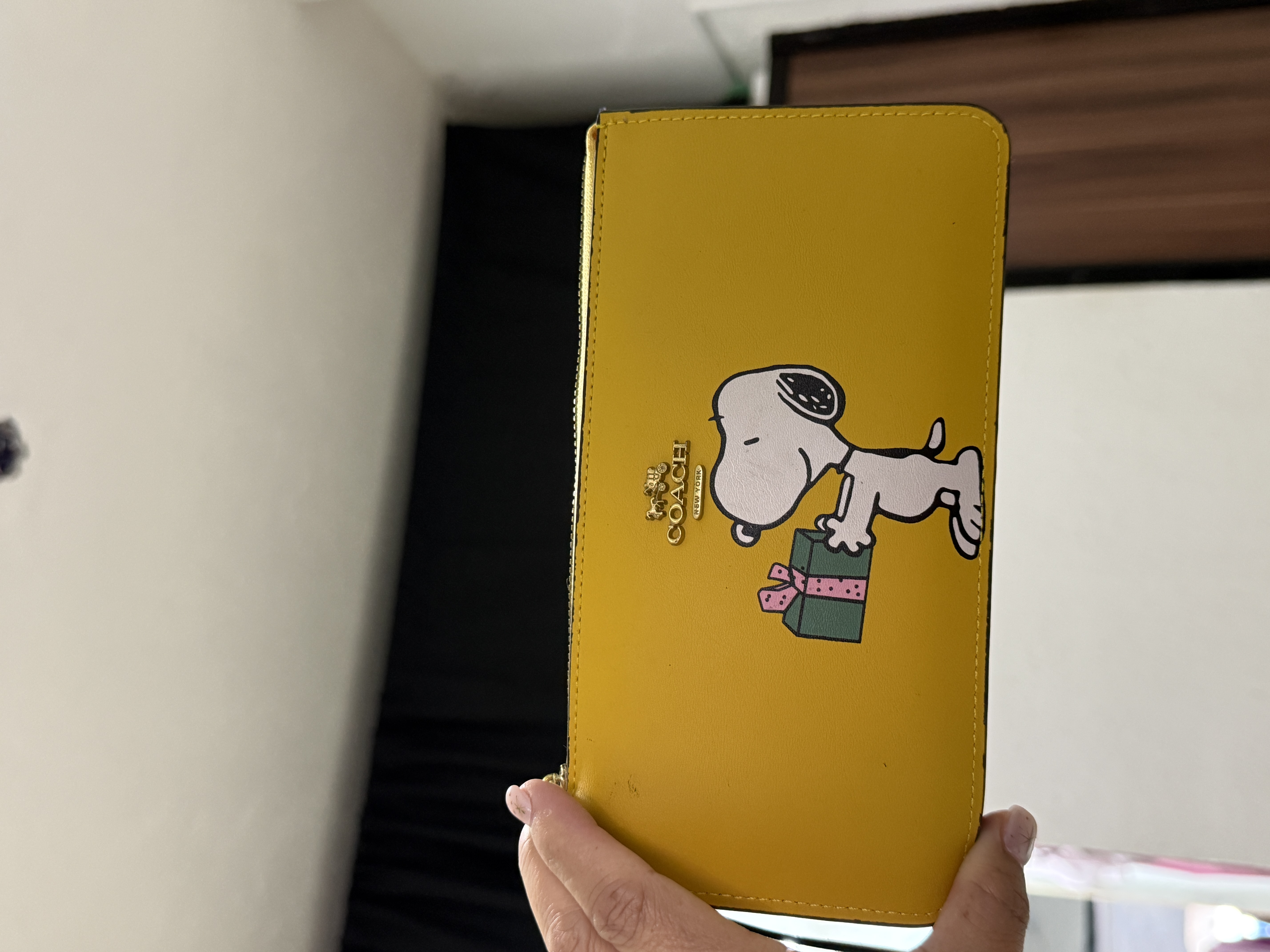 Cartera snoppi amarilla